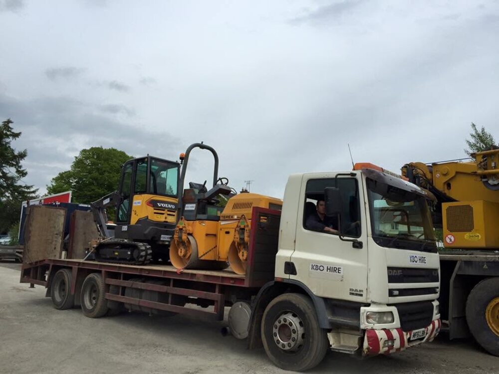 The KBO Hire lorry loaded with an excavator and rollers