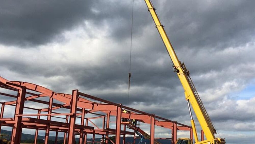 A KBO crane erecting a steel portal frame