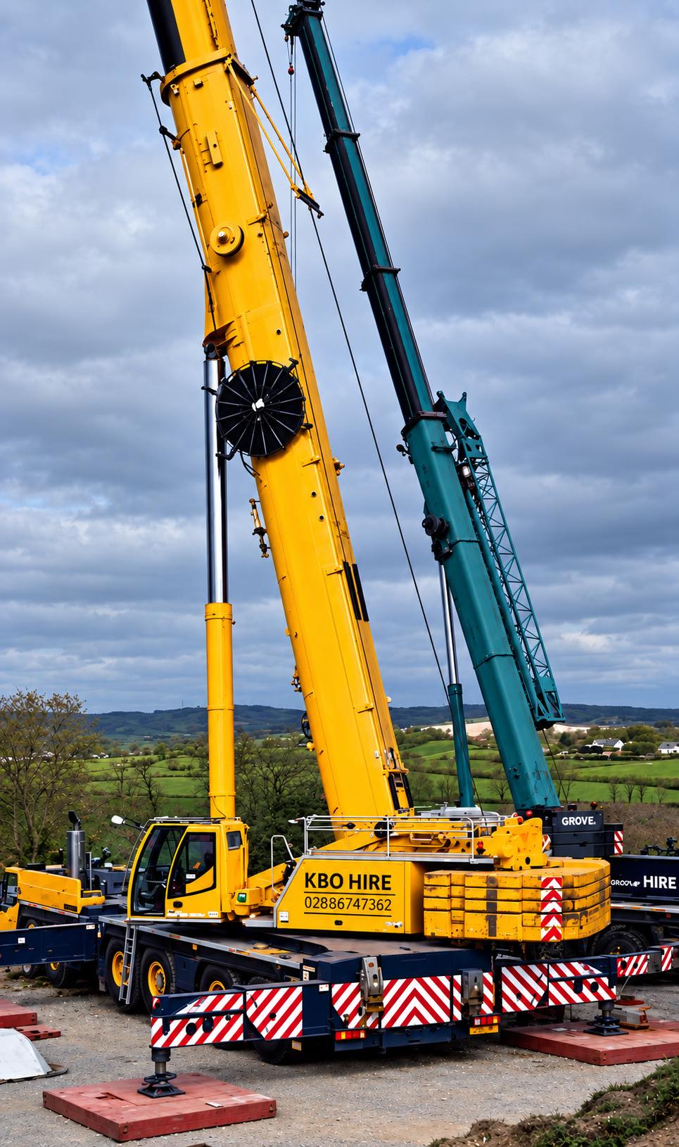 KBO Hire mobile crane set up on outriggers with its boom raised